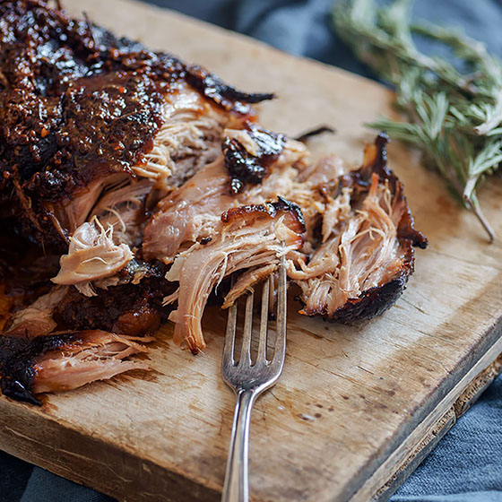 Slow-cooked pork glazed with Umami Booster